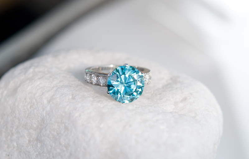 Silver ring with blue diamond